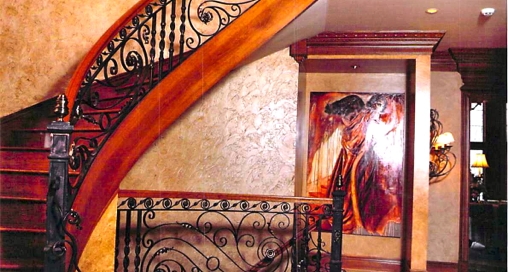 finelli ironworks handmade traditional style iron and wood staircase with forged scroll designs in waite hill ohio