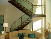 finelli ironworks custom modern design glass, wood, and steel staircase system with railing in cleveland ohio