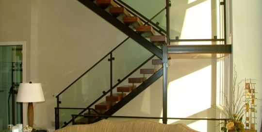 finelli ironworks custom modern design glass, wood, and steel staircase system with railing in cleveland ohio