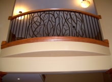 Finelli architectural iron and stairs custom forged nature-themed iron balcony in rocky river ohio