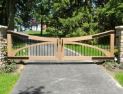 Finelli Architectural Iron and Stairs custom wood and iron elegant driveway gate in shaker heights ohio