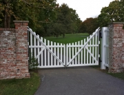 Finelli Architectural Iron and Stairs custom white wood driveway gate in bay village ohio