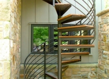 custom wood tread and iron spiral staircase handmade in northeast ohio by finelli architectural iron and stairs