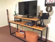 Finelli Ironworks Custom handmade wood and iron tv stand located in apartment in downtown cleveland, ohio