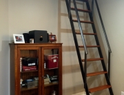finelli ironworks handmade custom natural iron and cherry wood interior library style ladder in downtown cleveland ohio