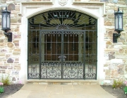 Finelli iron works custom handmade decorative wrought iron metal driveway and man gate in hunting valley ohio