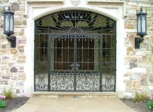 Finelli iron works custom handmade decorative wrought iron metal driveway and man gate in hunting valley ohio